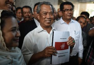 Malaysia’s Muhyiddin named PM in shock that sidelines old rivals