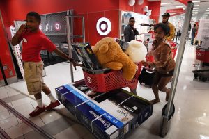 Target shares fall on mixed fourth-quarter results, but company touts same-day e-commerce growth
