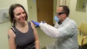 Doctors start giving second round of shots to volunteers in Seattle COVID-19 vaccine trial