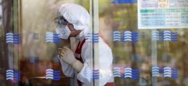 Japan COVID-19 doctors lack fresh masks, hazard pay: union survey
