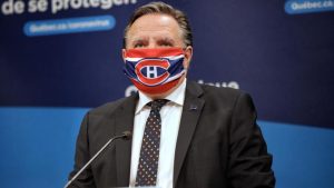 Quebec Premier wears Canadiens face mask sent to him by Weber