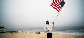 COVID-19 distancing compels shifts at the beach on crowded U.S. Memorial Day weekend