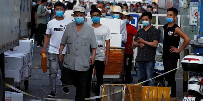 Beijing district in ‘wartime emergency’ after virus cluster at major food market