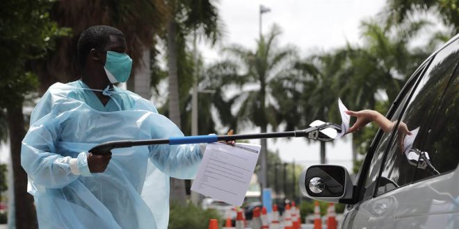 Florida sets grim coronavirus death toll record, while trailer truck outside funeral home raises COVID-19 fears